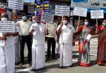 நீட் தேர்வை ரத்து செய்ய வேண்டும் பெட்ரோல் டீசல் விலையை குறைக்க வேண்டும் உள்ளிட்ட கோரிக்கைகளை வலியுறுத்தி தஞ்சாவூரில் அதிமுகவினர் ஆர்பாட்டம்