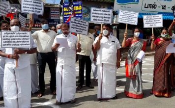 நீட் தேர்வை ரத்து செய்ய வேண்டும் பெட்ரோல் டீசல் விலையை குறைக்க வேண்டும் உள்ளிட்ட கோரிக்கைகளை வலியுறுத்தி தஞ்சாவூரில் அதிமுகவினர் ஆர்பாட்டம்
